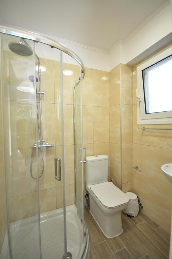 Dolphin Apartments Палеокастрица Экстерьер фото