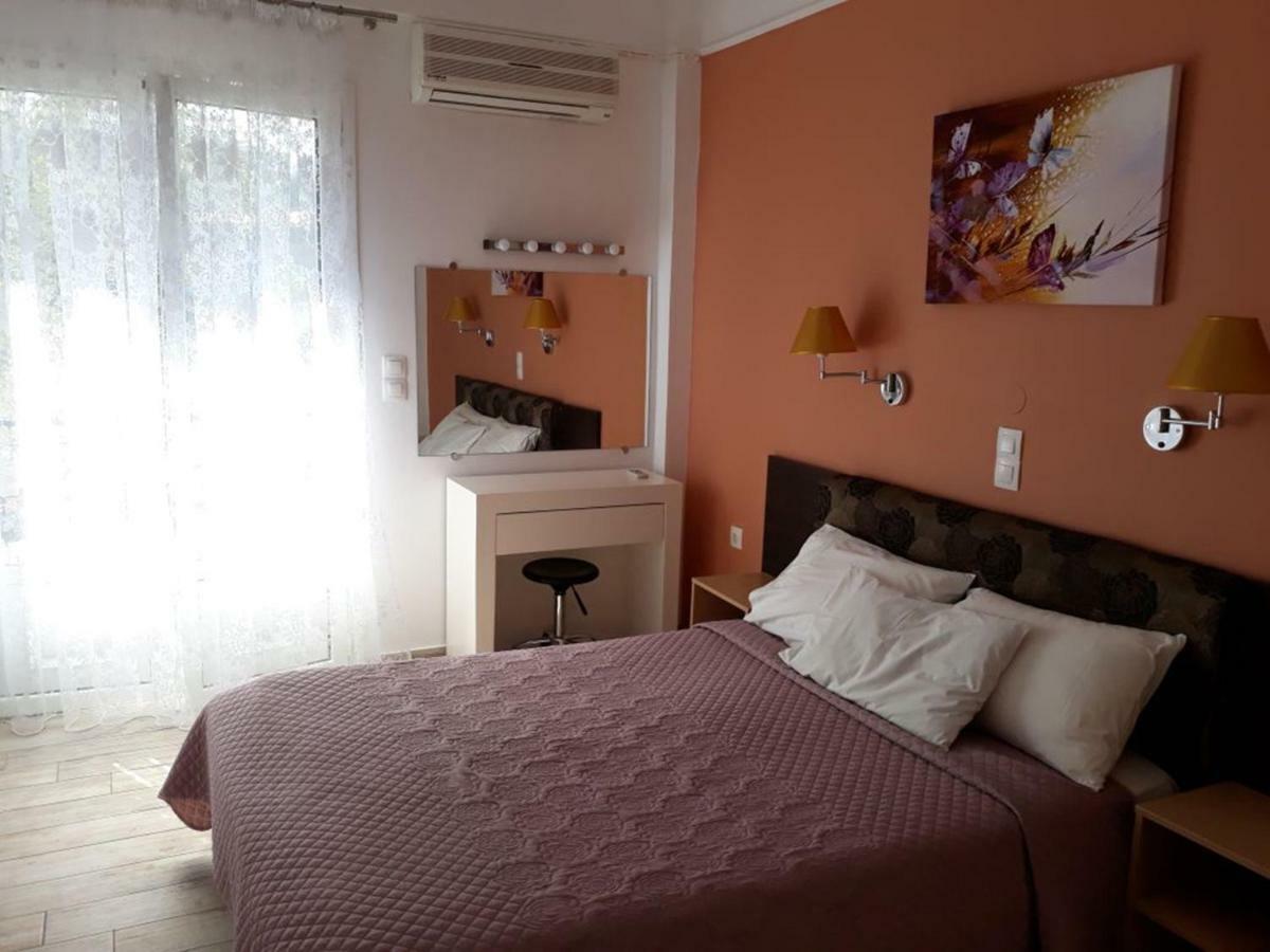 Dolphin Apartments Палеокастрица Экстерьер фото